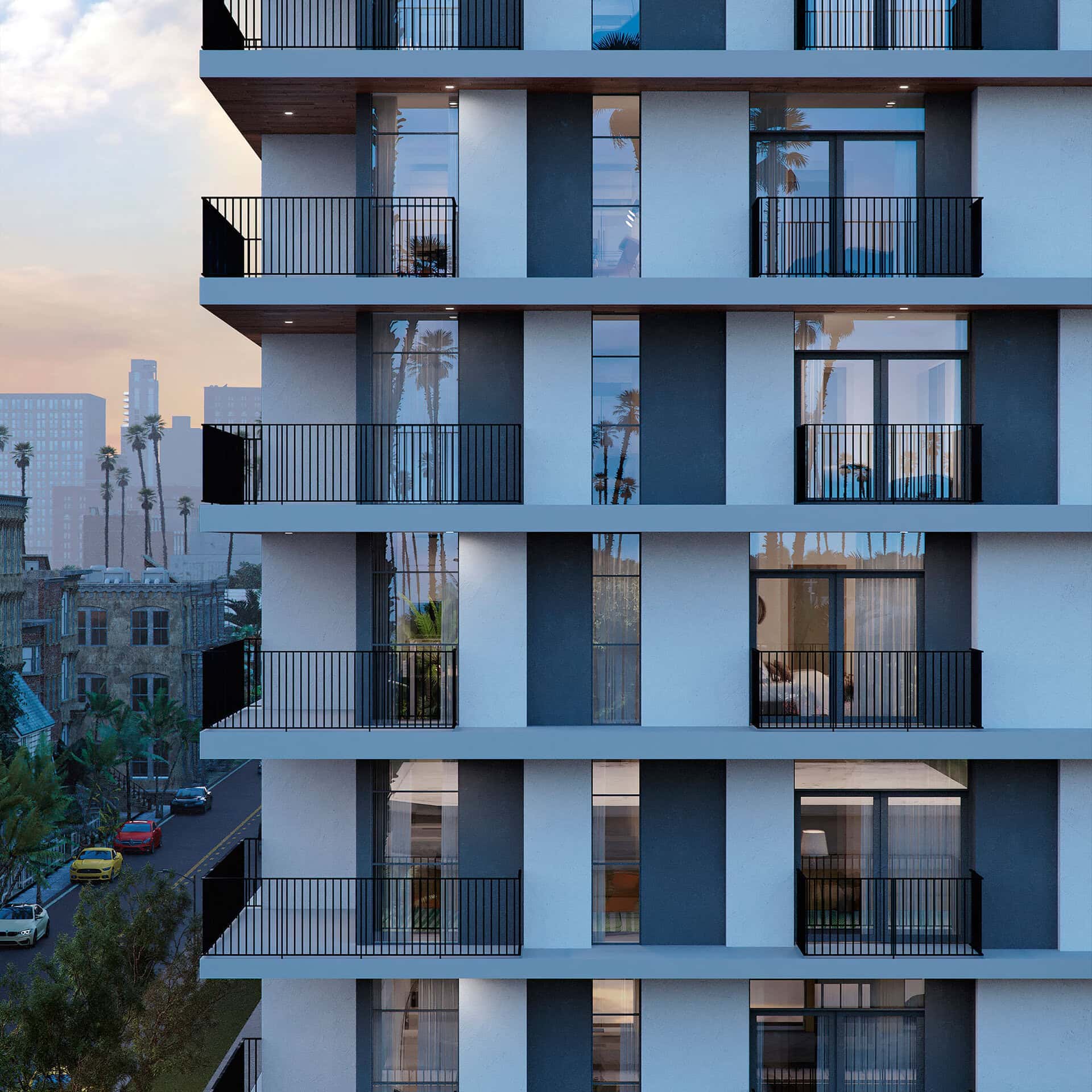 Contemporary residential apartment building with modern balconies and floor-to-ceiling windows.