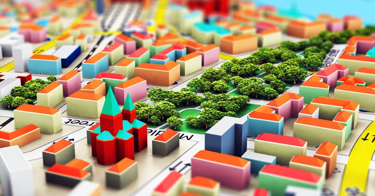 Colorful architectural model of a modern urban park and surrounding buildings with lush green trees and varied geometric shapes.